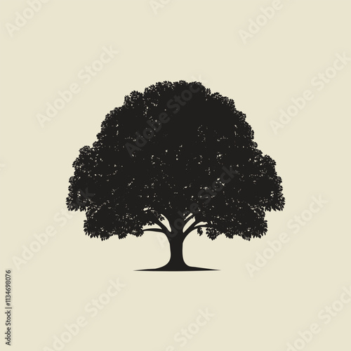 Silhouette of a tree with a perfectly rounded canopy