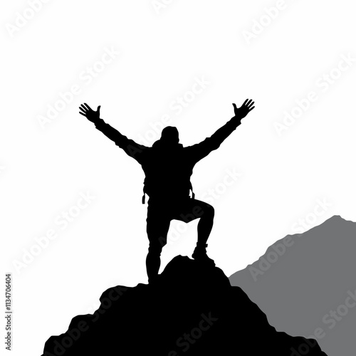 Silhouette of a hiker reaching the mountain peak with arms raised in victory.