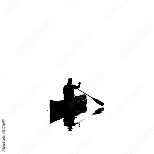 Silhouette of a man rowing a canoe on a calm lake