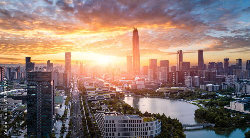 Obraz premium Aerial view of modern city commercial buildings skyline at sunrise in Ningbo, China