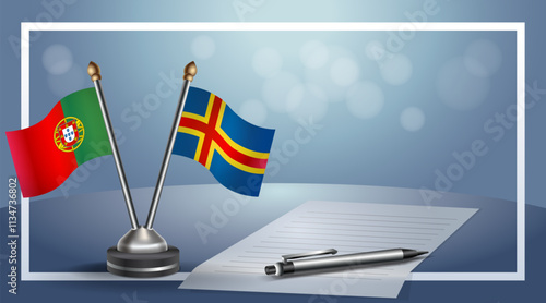 Portugal and Aland Islands National flags on small table with bokeh background, cooperative relationship