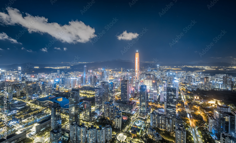 Night view of modern city financial district buildings in Shenzhen, China Night view of modern city financial district buildings in Shenzhen, China