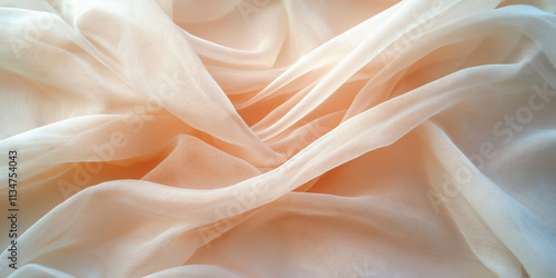 Soft, flowing fabric in a light peach hue, creating gentle waves.