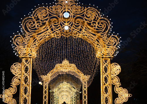 Decorative elements on the city street. Festive Christmas beautiful decor from neon lights. Sparkling night illumination	
