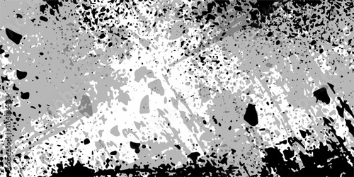 Abstract Cold gray and white grunge wall texture. Paint texture with spray effect and drop ink splashes. Artwork features a textured black grain effect with a captivating spray. Distressed grunge 