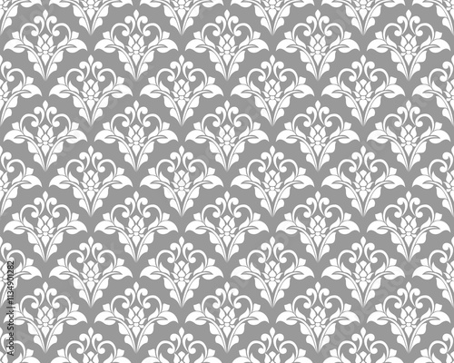 Wallpaper in Baroque style, damask. A seamless vector background. Gray and white texture Floral ornament.