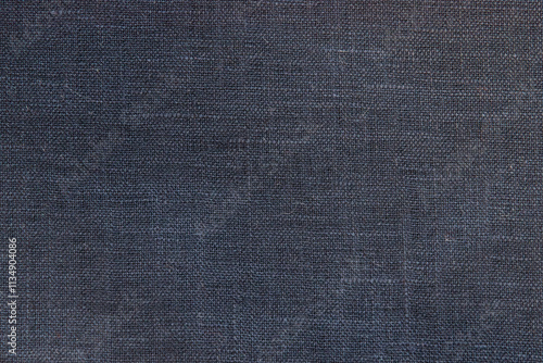 Dark navy color linen fabric texture closeup as textile background