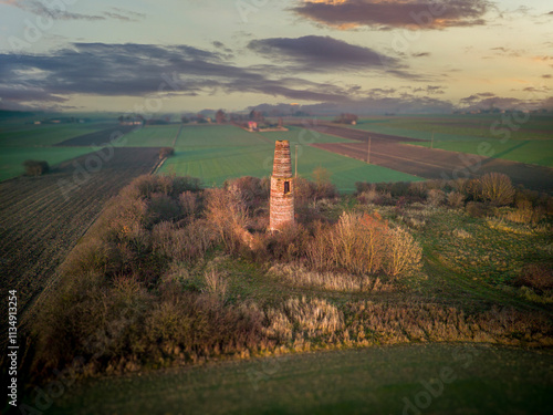 Obraz na płótnie A lonely old chimney in the middle of a field. w salonie