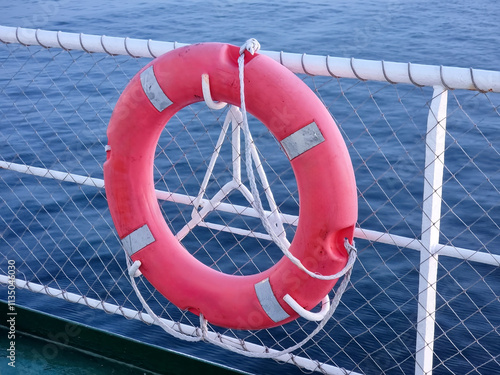 lifeline attached to the rail of a ship photo