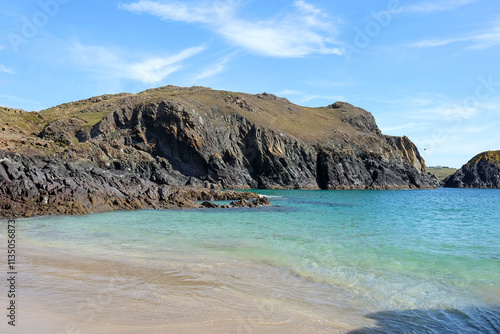 The sandy beach at Kynance Cove on the Lizard Peninsula, Cornwall, UK.