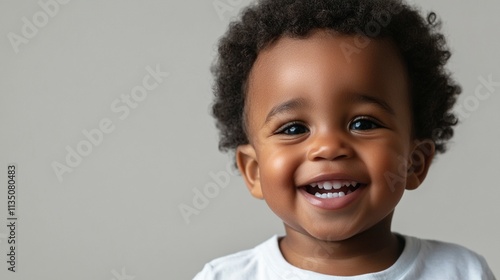 Joyful Moment: African American Little Boy Isolated with a Bright Smile Radiating Happiness for Children’s Marketing and Advertising Use