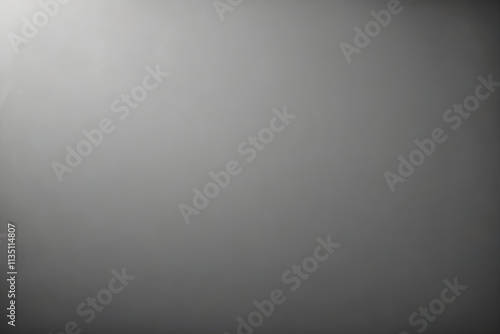 Empty grey wall texture background with light beam shining from above