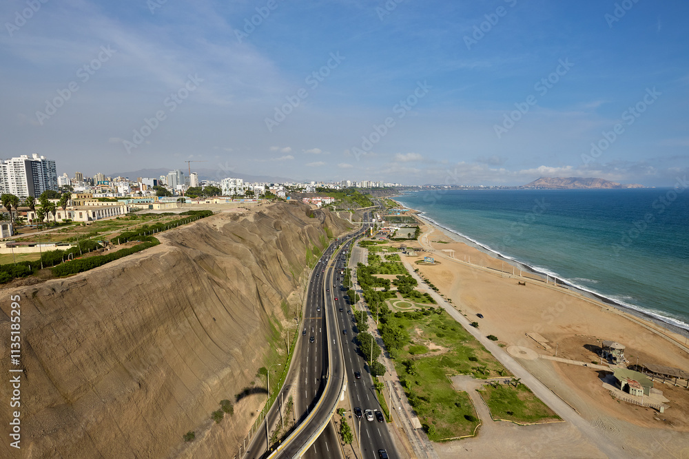 An aerial view of Lima’s Costa Verde reveals the perfect blend of urban life and natural beauty.With cliffs that kiss the Pacific and waves that call to surfers, this coastline is pure magic. An aerial view of Lima’s Costa Verde reveals the perfect blend of urban life and natural beauty.With cliffs that kiss the Pacific and waves that call to surfers, this coastline is pure magic.