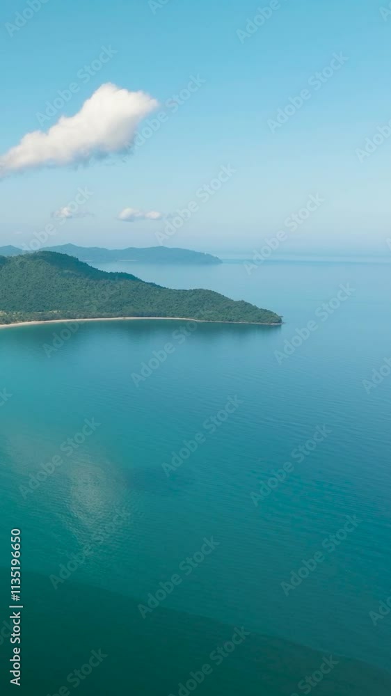 Borneo island coastline with beach and Kota Kinabalu city view. Malaysia. Vertical video. Borneo island coastline with beach and Kota Kinabalu city view. Malaysia. Vertical video.