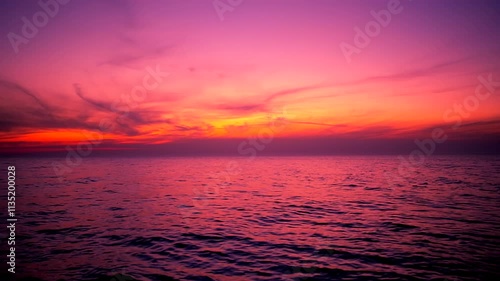 Beautiful sunset over the sea. Ocean, aqua, nature, land, lake, water, waves, wavy, ripple, tide, cloud, bright, magic, sky, color, travel, peace, relax, calm, dark, scene, view, full hd. ProRes 422HQ