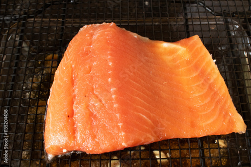 Fresh salmon filet after it is brined and smoked in a barbeque