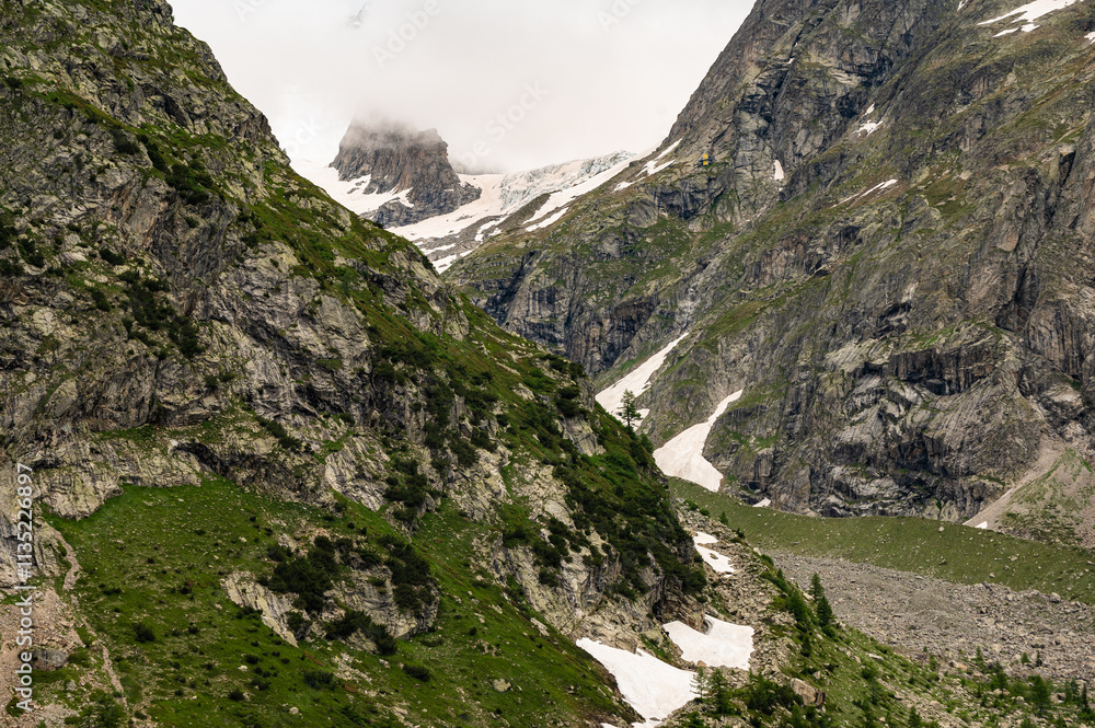 Pre de Bar glacier. Melting Glacier in the Alps. Val Ferret, Courmayeur, Aosta, Italy. Tour du Mont Blanc. Mountains, Panorama
Pre de Bar glacier. Melting Glacier in the Alps. Val Ferret, Courmayeur, Aosta, Italy. Tour du Mont Blanc. Mountains, Panorama