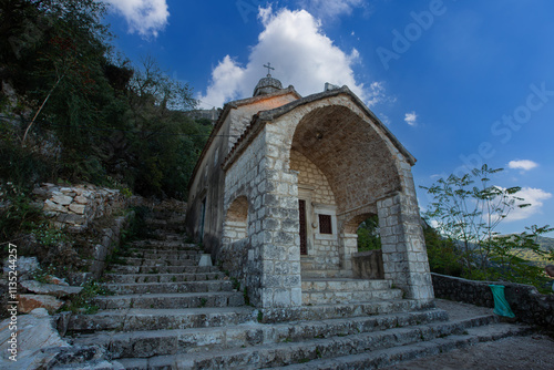 Obraz na płótnie The Church of Our Lady of Remedy on the slope of St. John mountain above Old Town of Kotor, Montenegro. w salonie
