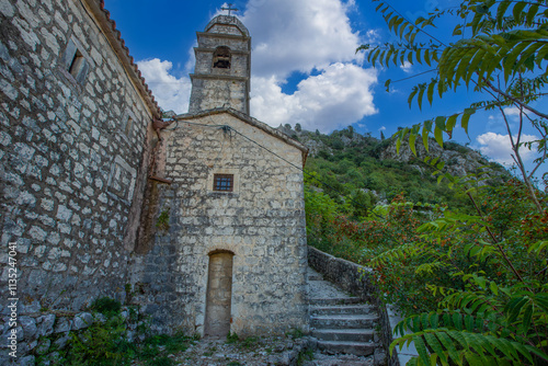 Obraz na płótnie The Church of Our Lady of Remedy on the slope of St. John mountain above Old Town of Kotor, Montenegro. w salonie