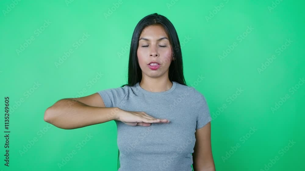 Mexican patriot woman giving the civil salute to the mexican flag and singing the national anthem Mexican patriot woman giving the civil salute to the mexican flag and singing the national anthem