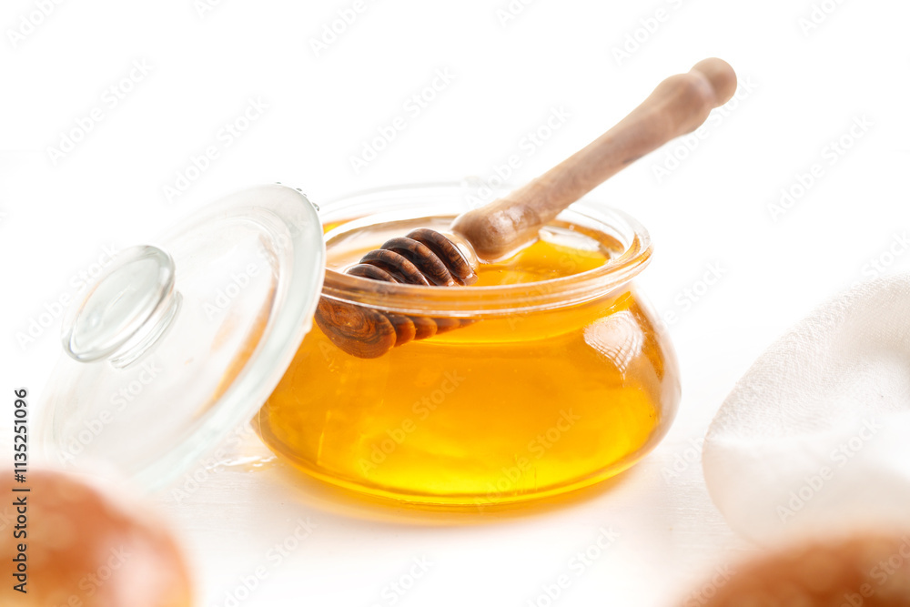 A Jar Of Honey With A Wooden Spoon Next To It With A Wooden Spoon A Jar Of Honey With A Wooden Spoon Next To It With A Wooden Spoon