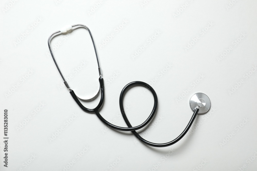 Stethoscope on gray background, top view Stethoscope on gray background, top view