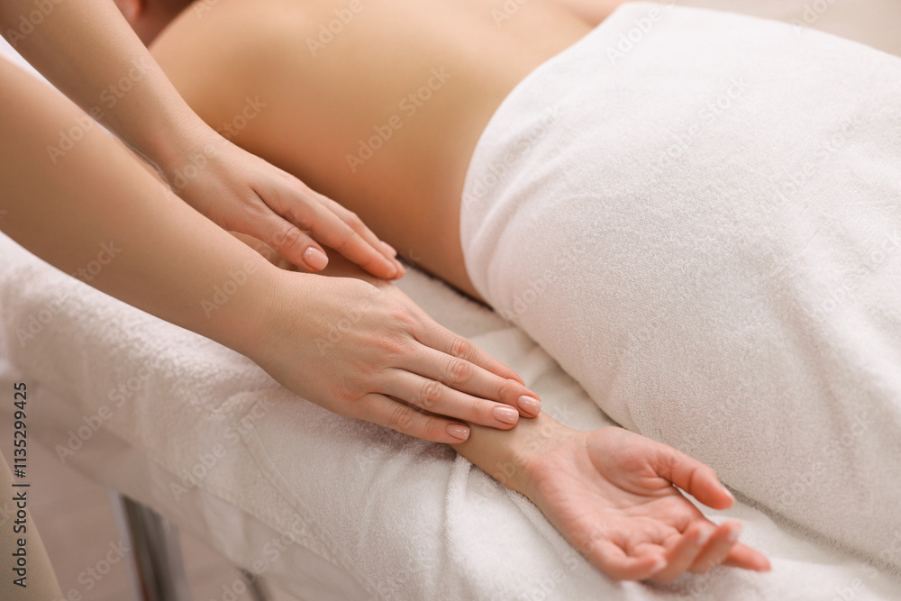Woman receiving massage in spa salon, closeup Woman receiving massage in spa salon, closeup