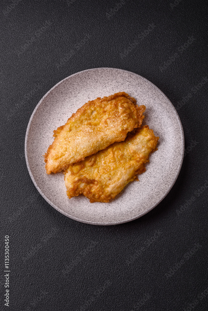 Grilled chicken or turkey chop with salt, spices and herbs Grilled chicken or turkey chop with salt, spices and herbs