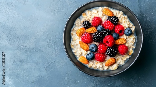 Oatmeal with Berries and Almonds: A delightful and healthy breakfast bowl, brimming with fresh raspberries, blackberries, and blueberries, topped with crunchy almonds.