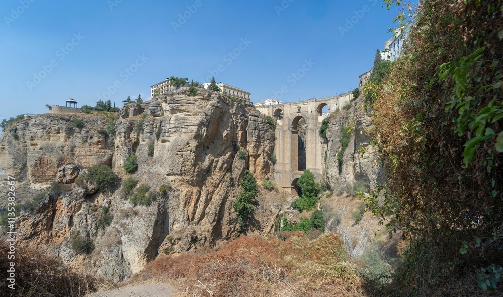 Views of the new bridge in the medieval city of Ronda and the great canyon. Malaga Views of the new bridge in the medieval city of Ronda and the great canyon. Malaga