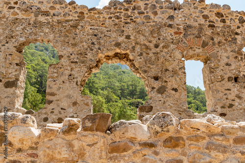 The ancient city of Olympos is a Lycian settlement located 10 km north of Tahtalı Mountain in Kumluca District, west of Antalya. It was founded as a Lycian port city. It is an important tourism locati photo