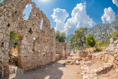 The ancient city of Olympos is a Lycian settlement located 10 km north of Tahtalı Mountain in Kumluca District, west of Antalya. It was founded as a Lycian port city. It is an important tourism locati photo