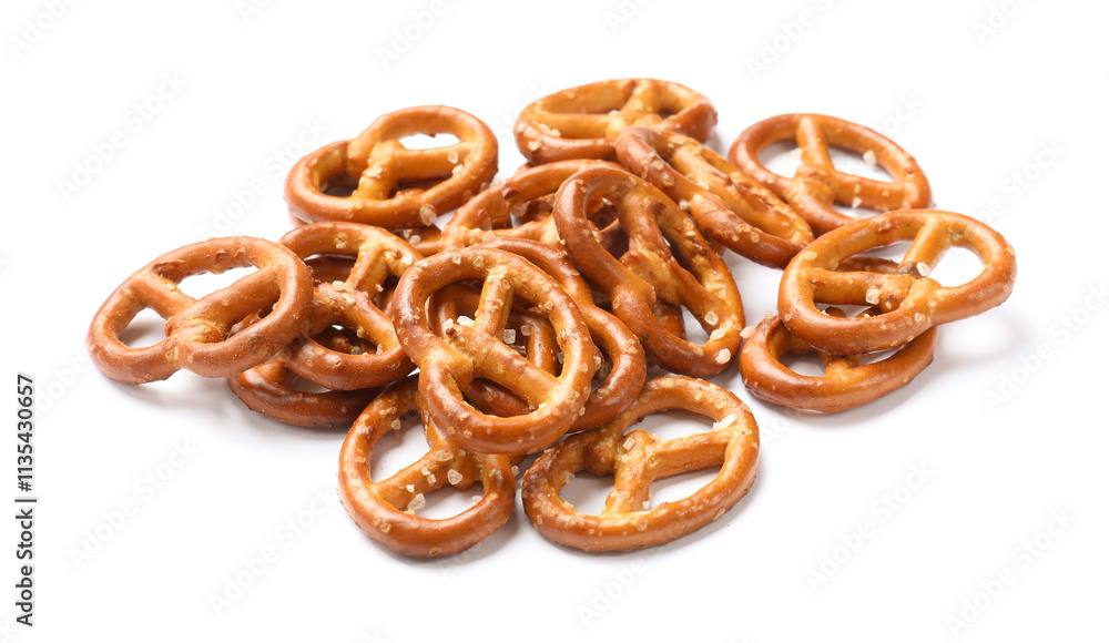 Many delicious pretzel crackers isolated on white Many delicious pretzel crackers isolated on white