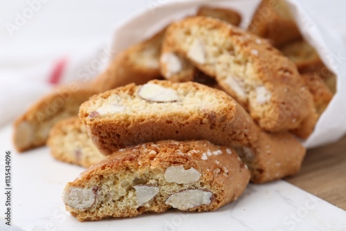 Traditional Italian almond biscuits (Cantucci) on board, closeup