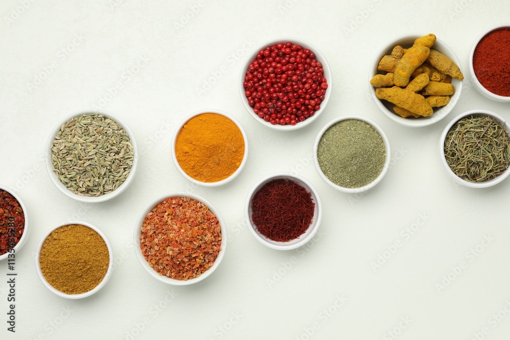 Different aromatic spices and herbs on white background, flat lay Different aromatic spices and herbs on white background, flat lay