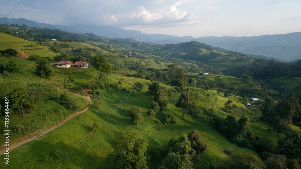 Scenic view of rolling green hills and countryside homes in serene landscape Scenic view of rolling green hills and countryside homes in serene landscape