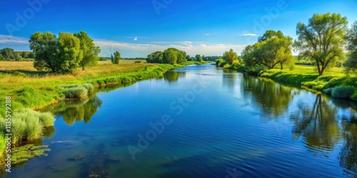 Tranquil river flowing through lush green landscape under a clear blue sky , peaceful, serene, water, nature, landscape, scenery