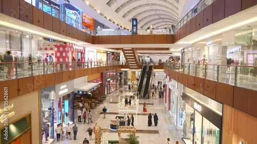 illuminated dubai city mall top floor shopping hall walking pov slow motion panorama 4k uae
