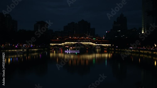 Day to night time-lapse view of Anshun Bridge in Jinjiang, Chengdu, China photo