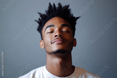 Portrait of a Young Man with Natural Hair, Exuding Calmness and Confidence