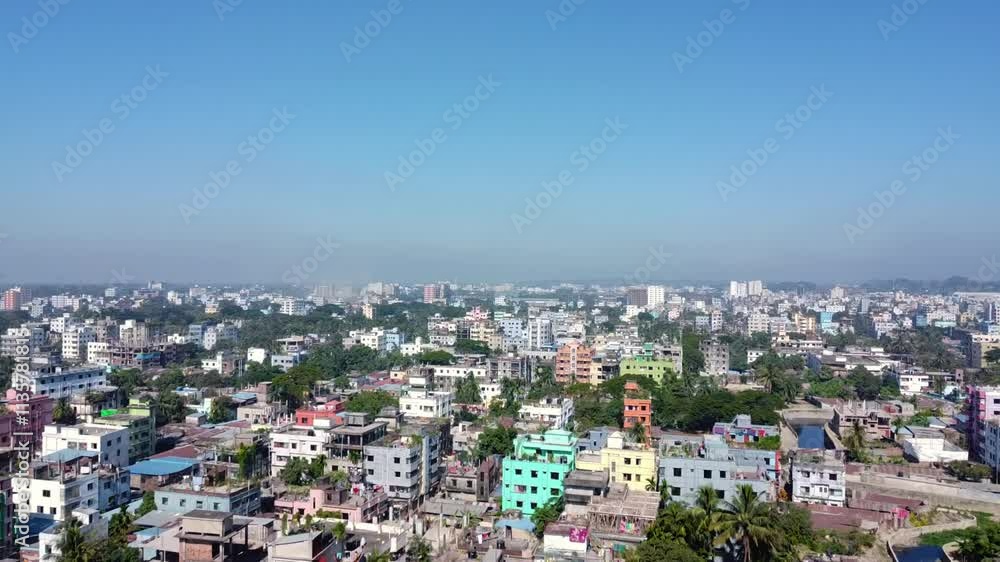 Buildings are being constructed by filling ponds and cutting tree in the cities of Bangladesh. It is endangering the environment. Skyline or Cityscape of Chittagong City,Bangladesh. Downtown of chitta Buildings are being constructed by filling ponds and cutting tree in the cities of Bangladesh. It is endangering the environment. Skyline or Cityscape of Chittagong City,Bangladesh. Downtown of chitta