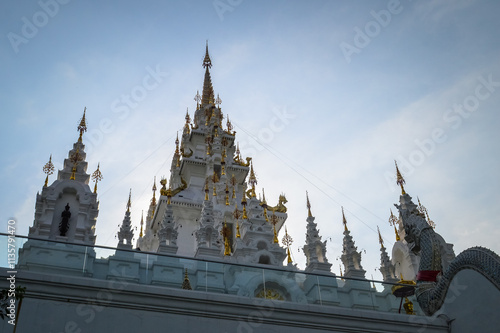 White Pagoda or White Castle ,Architecture (Loha Prasat Phra That Si Mueang Pong) at Wat Aranyawat, Chiang mai, Northern Thailand. photo