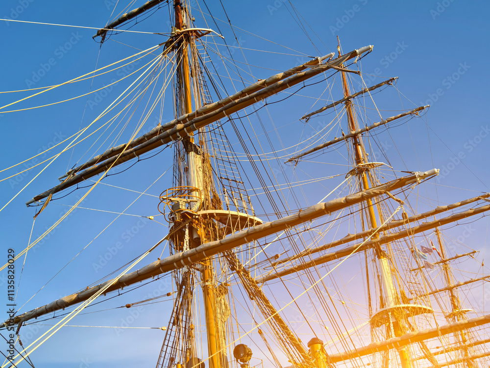 Ropes stretched across the masts of an old ship Ropes stretched across the masts of an old ship