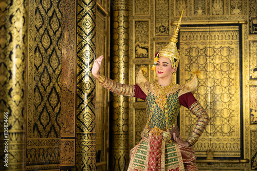 Pantomime (Khon) is traditional Thai classic masked play enacting scenes from the Ramayana with a backdrop of Thai paintings in a public place at Wat Phra Khao, Ayutthaya province, Thailand photo