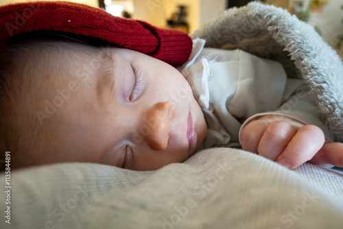 Stockholm, Sweden The face of a newborn two- month old girl sleeping. photo