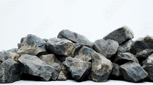 Natural and Rough Black Rocks Piled Together on a White Background for Creative Design, Illustrations, and Textures in Various Projects photo