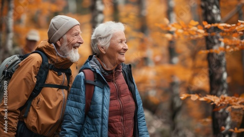 Active seniors on a walk in autumn forest