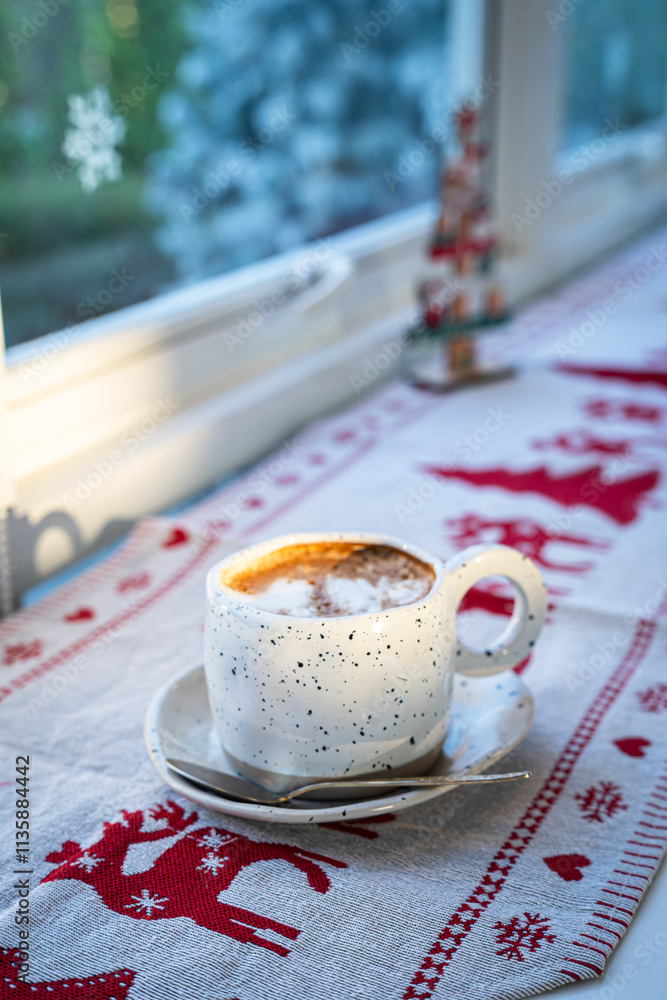Close up of Hot coffee latte with latte art milk foam in cup mug with Xmas decors and Xmas tree baubles on wood desk Celebrating Merry Christmas and New year,Merry x-mas