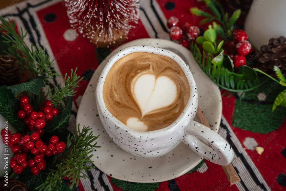 Close up of Hot coffee latte with latte art milk foam in cup mug with Xmas decors and Xmas tree baubles on wood desk Celebrating Merry Christmas and New year,Merry x-mas