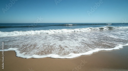 Serene Ocean Waves Crashing on Sandy Beach